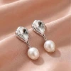 European and American irregular smooth surface, special-shaped imitation pearl ear studs, copper alloy, high-end, niche and light luxury earrings, cross-border accessories Specification image
